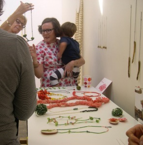 Mel Young's ArtMonth talk (with Bridget Kennedy's Eat Me! series on the wall)